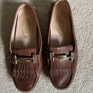 TOD’s brown leather loafers